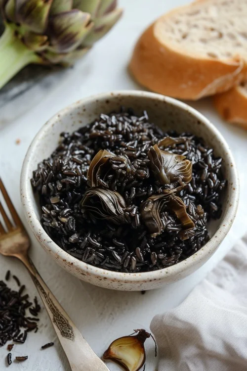 elaboracion arroz negro con alcachofas